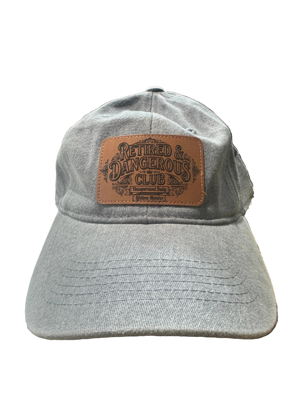 grey vintage hat with a leather patc thats say retired and dangerous
